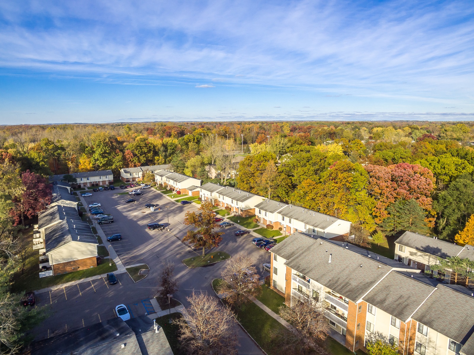 apartment complex aerial photo with fall color trees