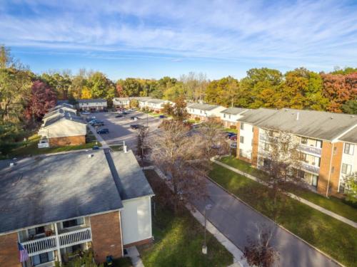 An aerial view of an apartment complex in the fall.